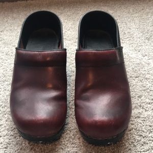 Dansko clogs, cranberry color.